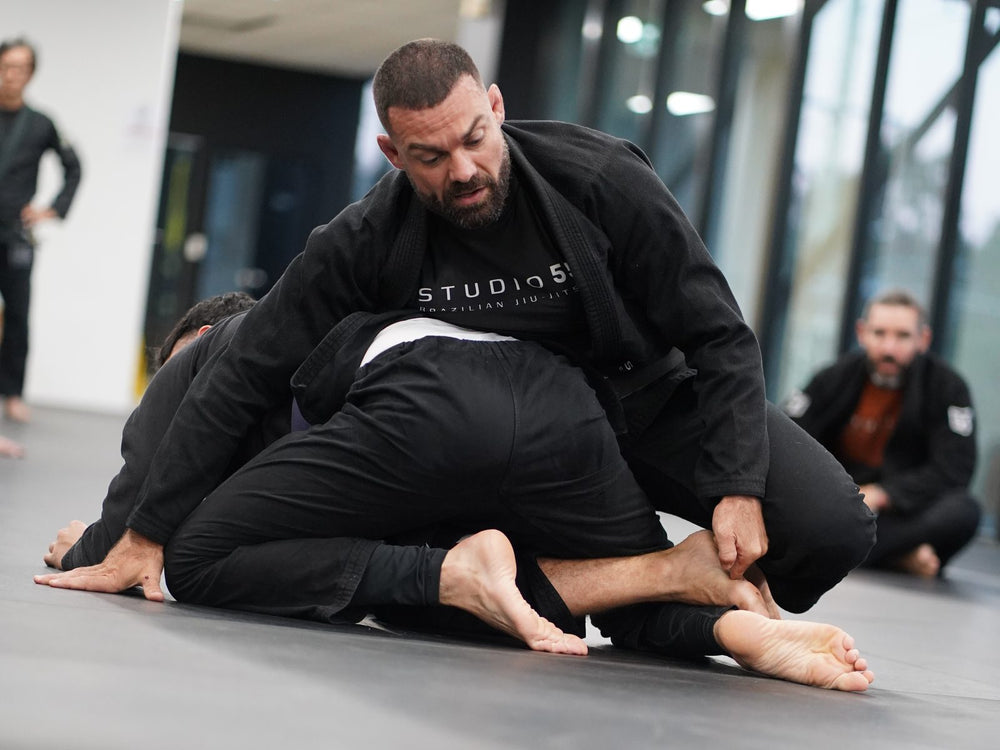 Professor Paulo Lima teaching an advanced Brazilian Jiu Jitsu class at Studio 55 Loganholme